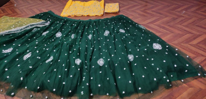 Dark green soft net sequence embroidered work ceremonial lehenga choli