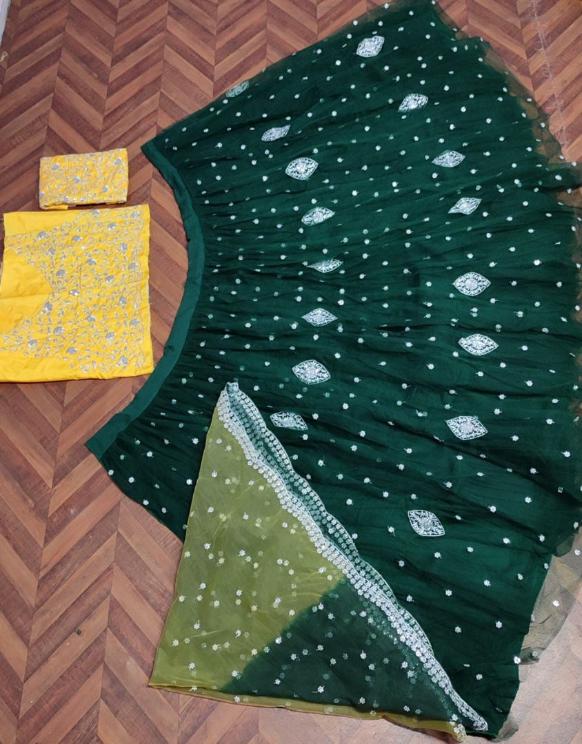 Dark green soft net sequence embroidered work ceremonial lehenga choli