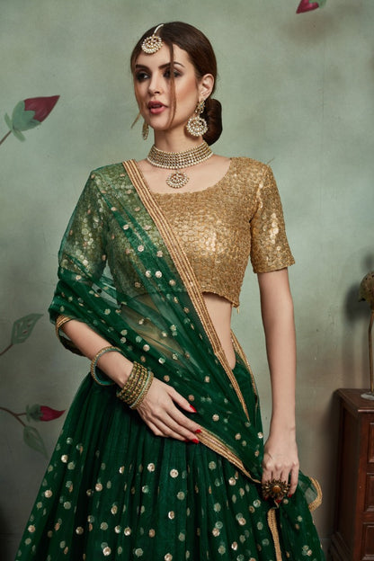 Dark green soft net sequence worked lehenga choli