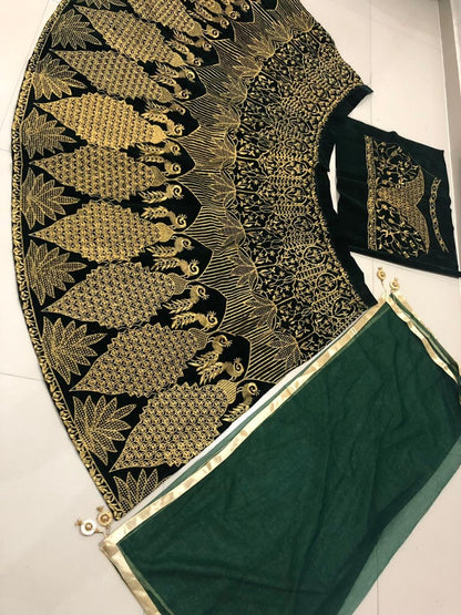 Dark green velvet heavy embroidered wedding lehenga choli