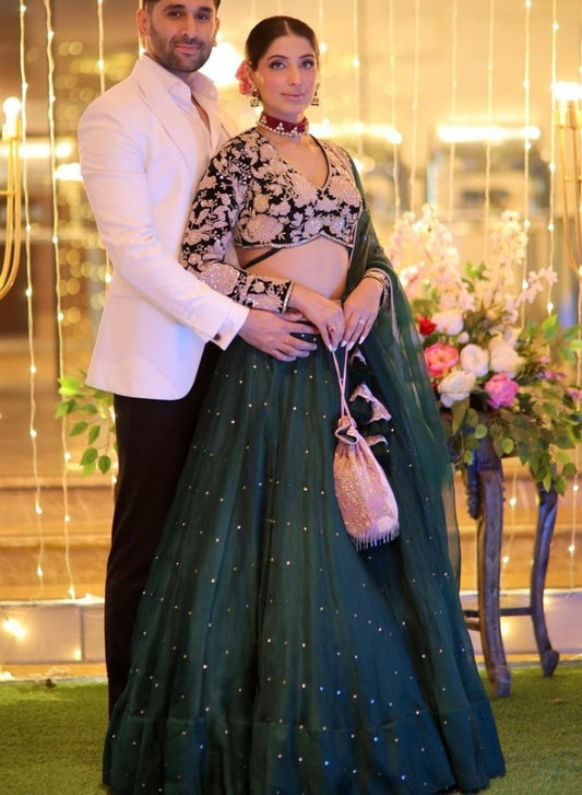 Dark green vevlet embroidery worked wedding lehenga choli
