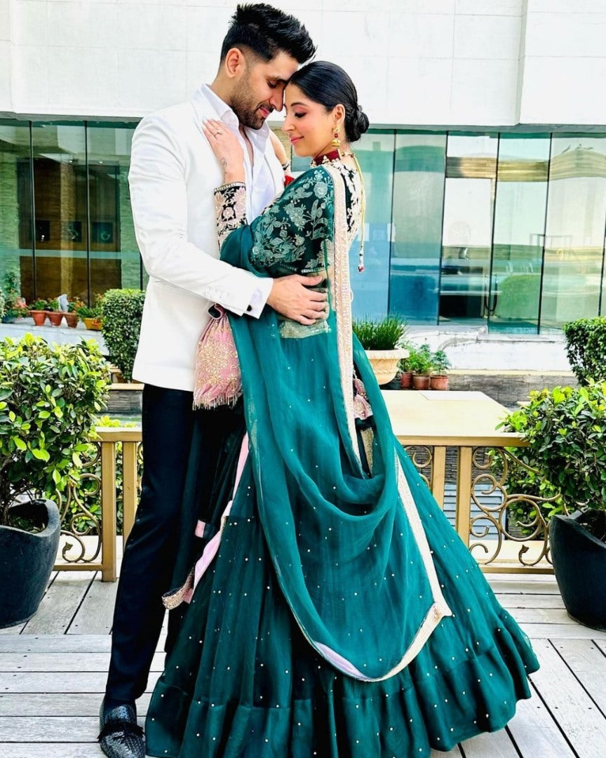 Dark green vevlet embroidery worked wedding lehenga choli