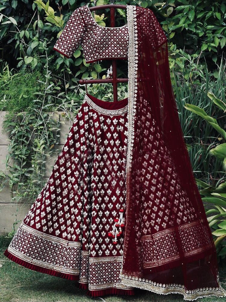 Dark maroon two tone tapeta silk heavy embroidered wedding lehenga choli