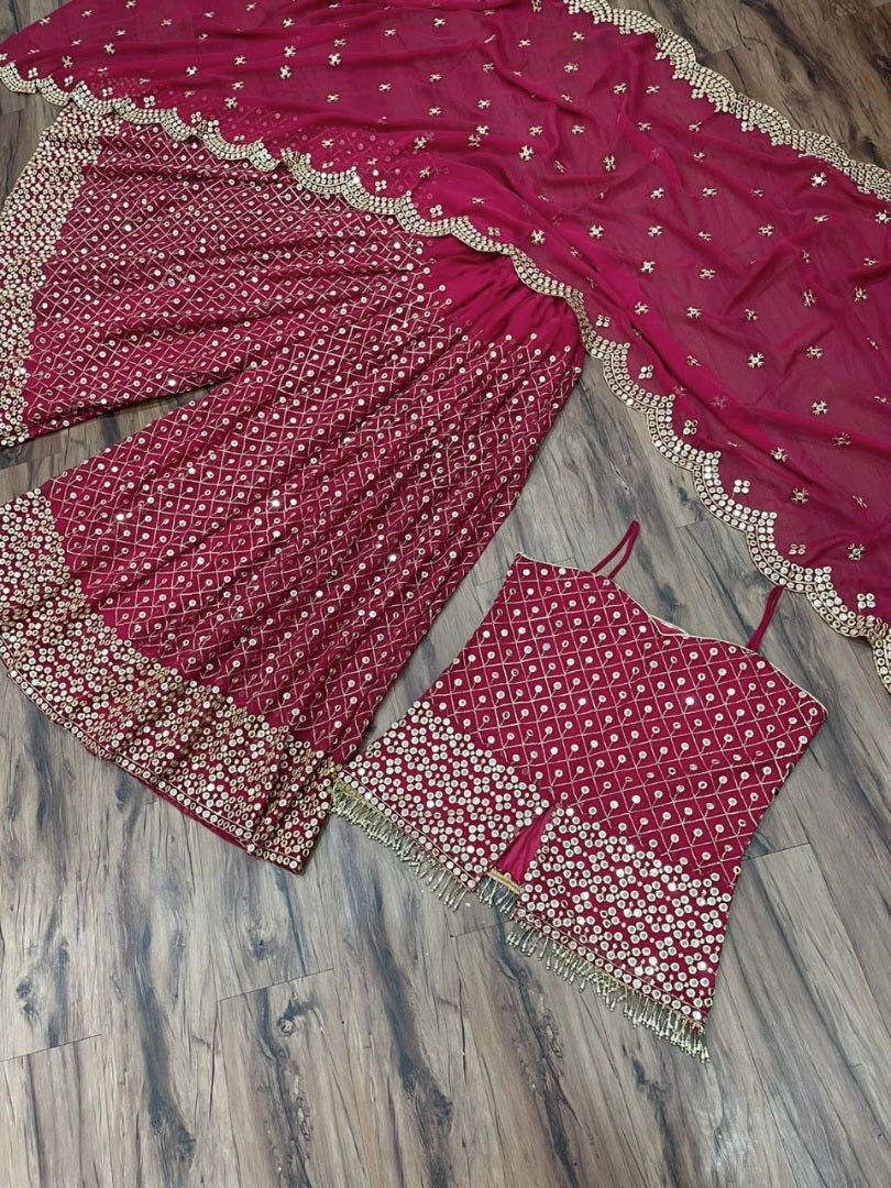 Dark pink georgette heavy sequence work plazzo suit