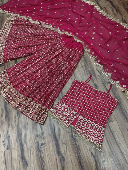 Dark pink georgette heavy sequence work plazzo suit