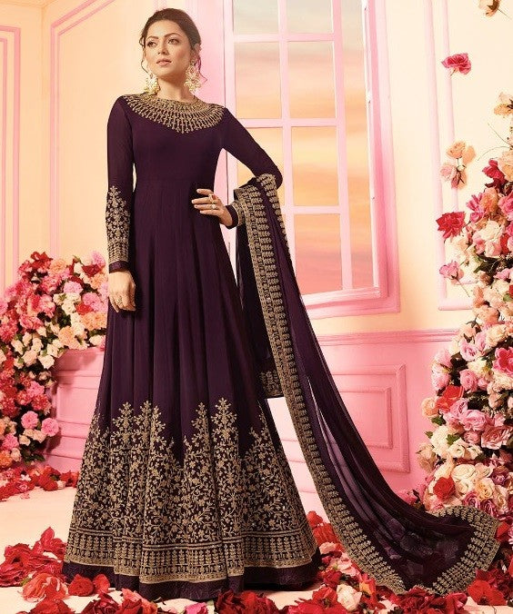 Dark purple heavy emboridered long wedding gown with dupatta