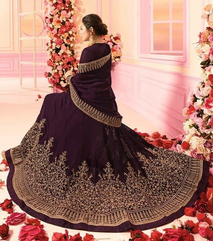 Dark purple heavy emboridered long wedding gown with dupatta