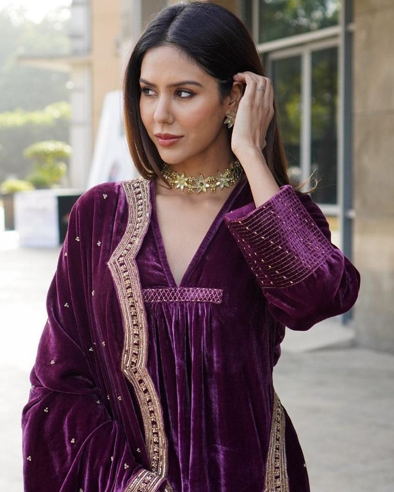 Dark purple heavy velvet embroidered work designer plazzo suit