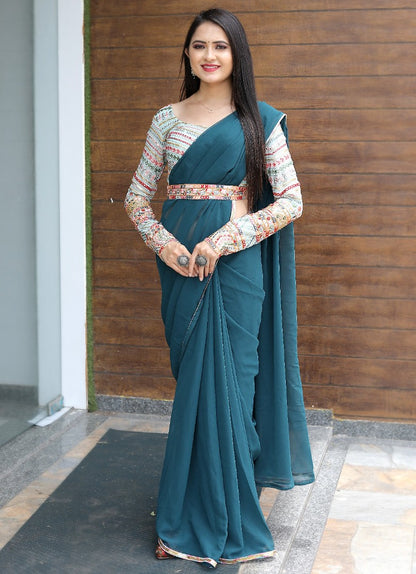 Dark rama designer georgette party wear saree with stitched blouse