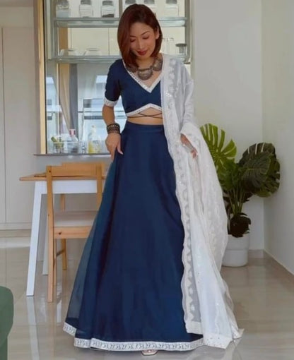 Dark rama organza plain party wear lehenga choli