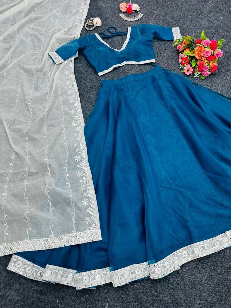 Dark rama organza plain party wear lehenga choli