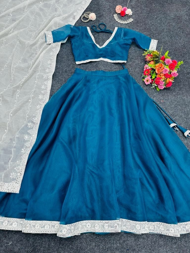 Dark rama organza plain party wear lehenga choli