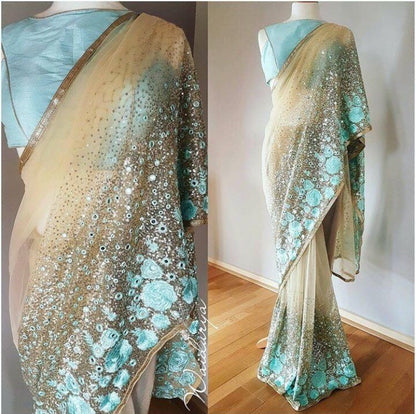Design embroidered ceremonial saree