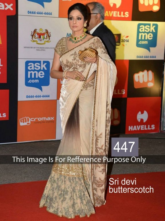 Designer cream embroidered ceremonial saree