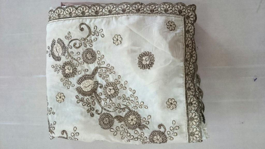Designer cream embroidered ceremonial saree