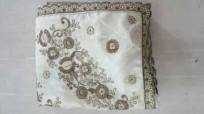 Designer cream embroidered ceremonial saree