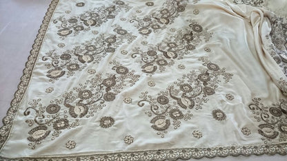 Designer cream embroidered ceremonial saree