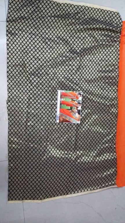 Designer embroidered orange saree