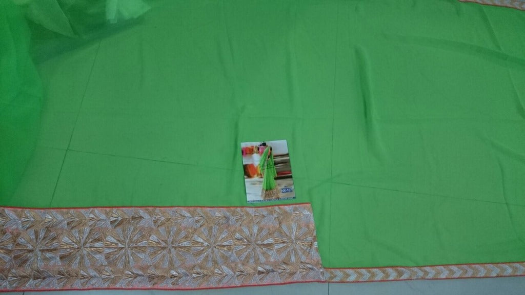 Designer green embroidered ceremonial saree