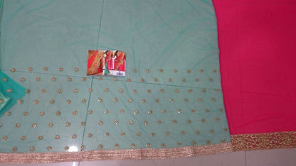 Designer peach and rama embroidered saree