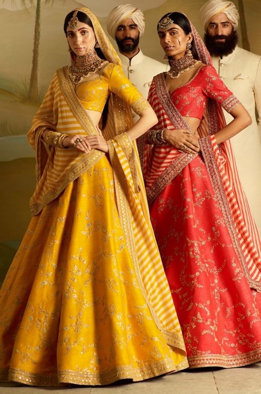 Designer red and yellow embroidered bridal ceremonial lehenga