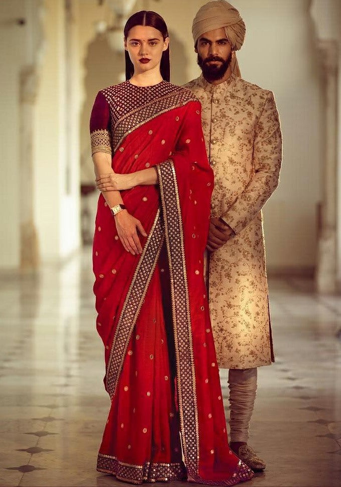 Designer royal look embroidered red saree