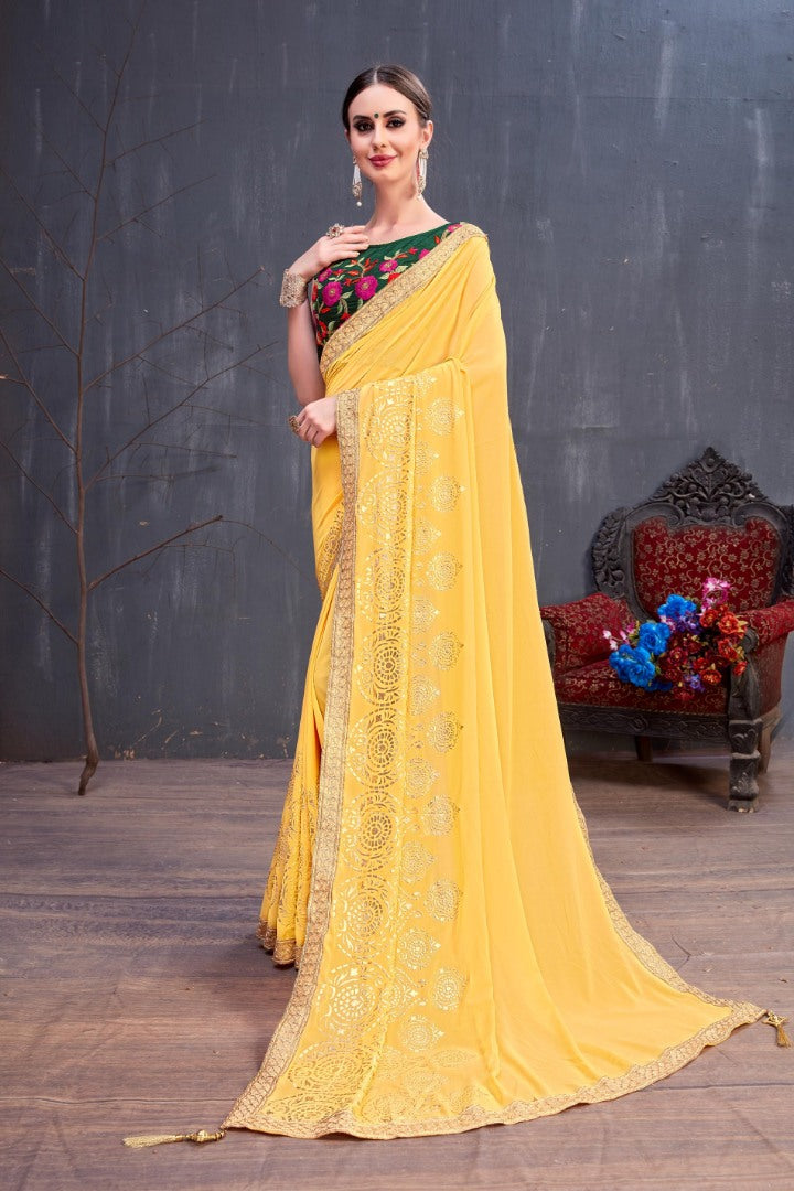 Designer yellow embroidered partywear saree