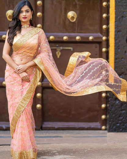 Dusty rose heavy nylon thread zari sequence work saree