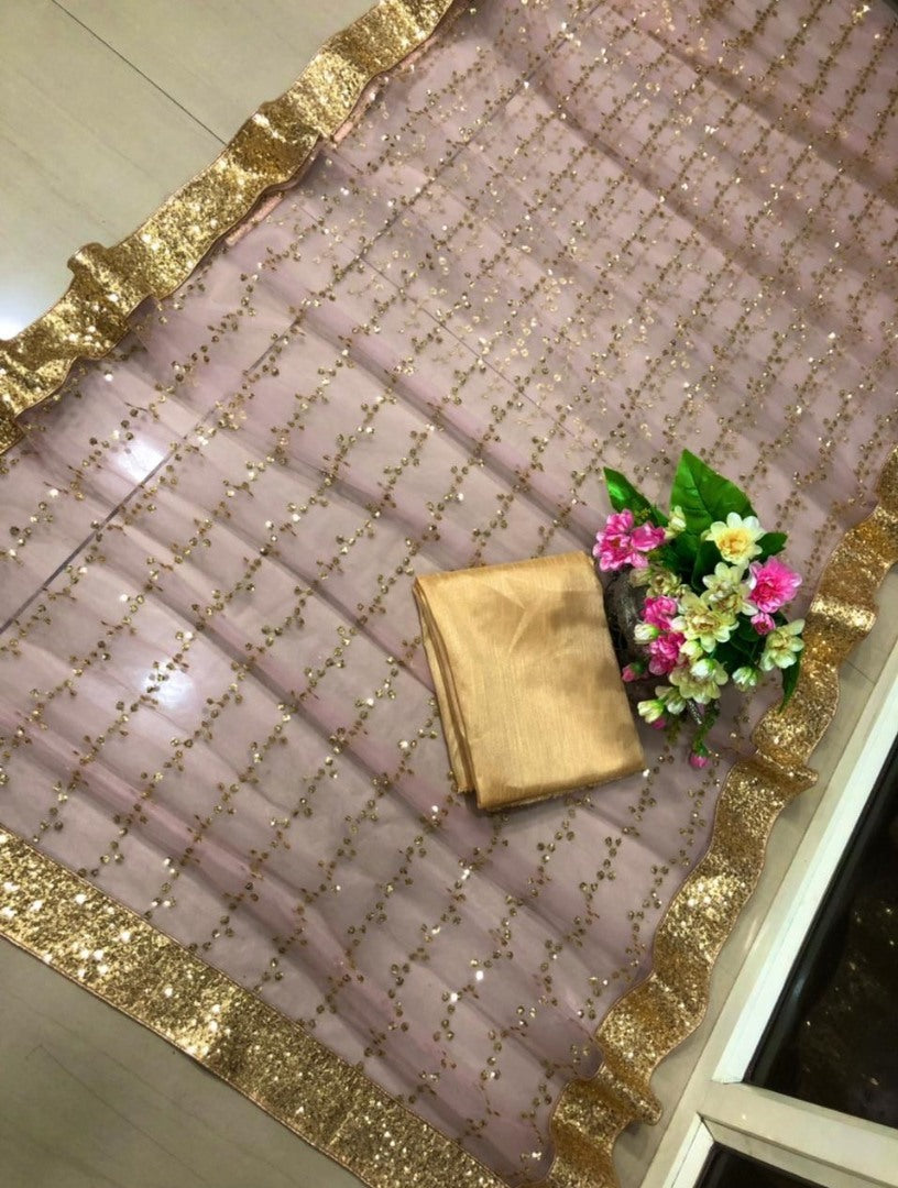 Dusty rose heavy nylon thread zari sequence work saree