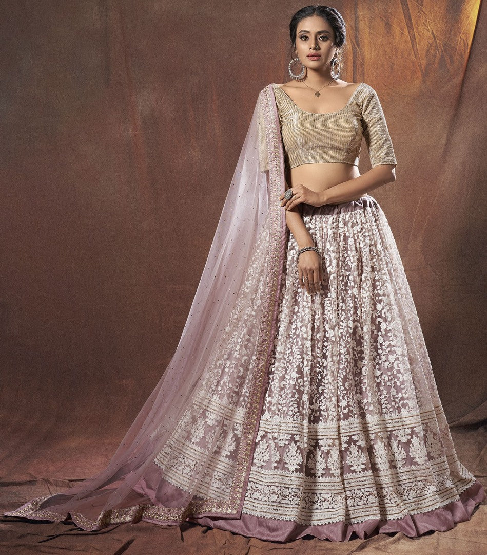 Dusty rose lycra soft net thread and zari work lehenga choli
