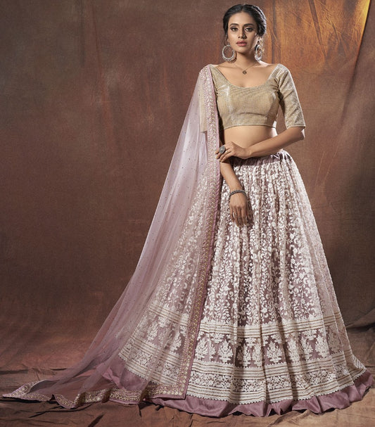 Dusty rose lycra soft net thread and zari work lehenga choli