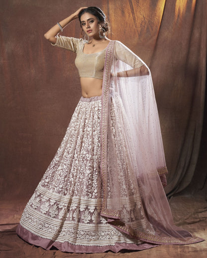 Dusty rose lycra soft net thread and zari work lehenga choli