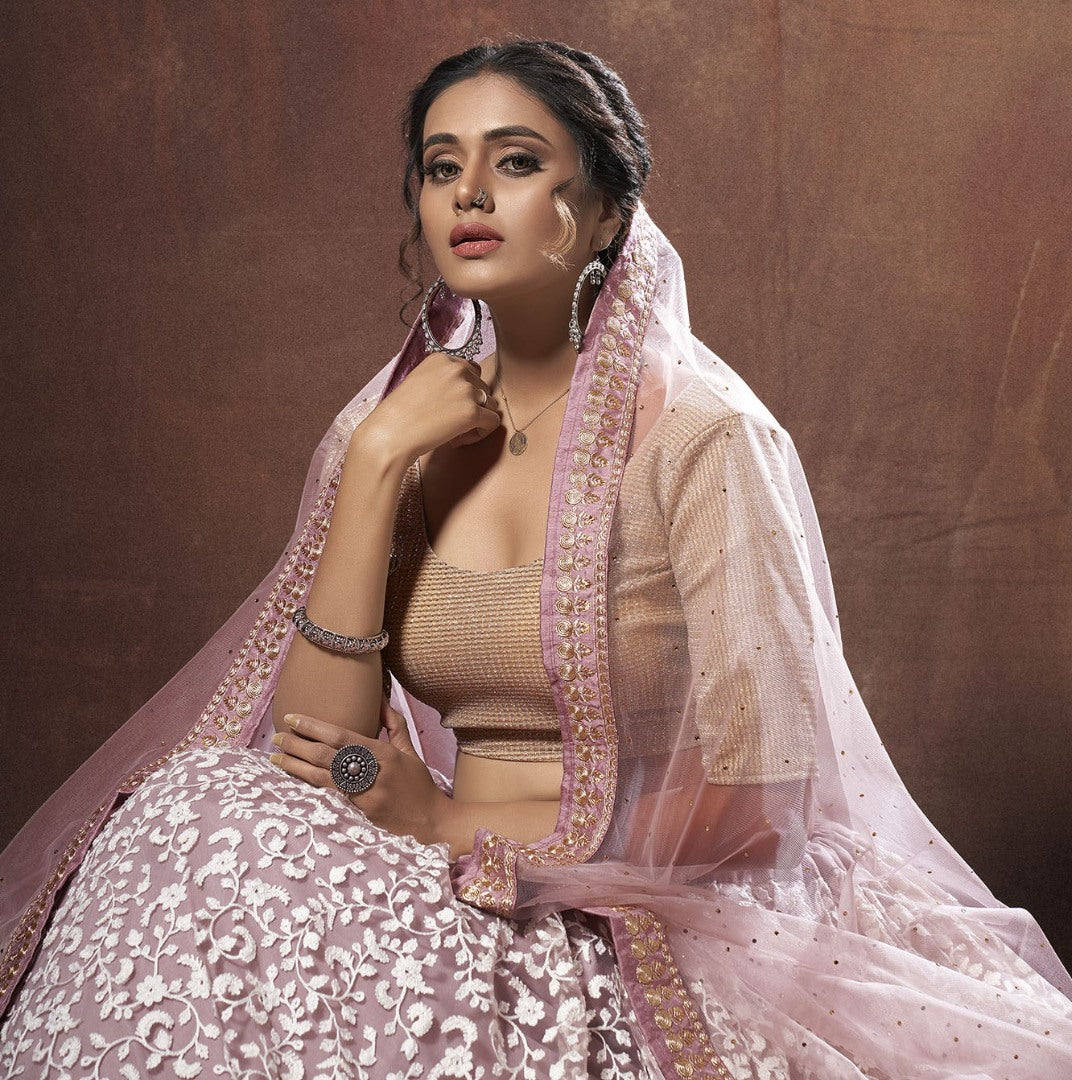 Dusty rose lycra soft net thread and zari work lehenga choli