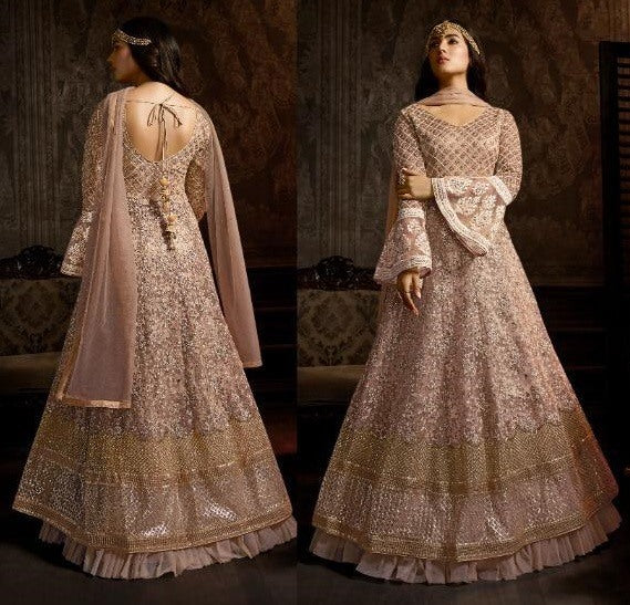 Dusty rose net heavy embroidered designer wedding gown with dupatta