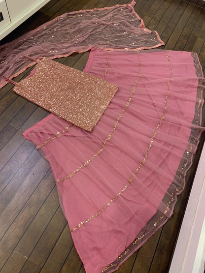 Dusty rose net sequence work long top lehenga