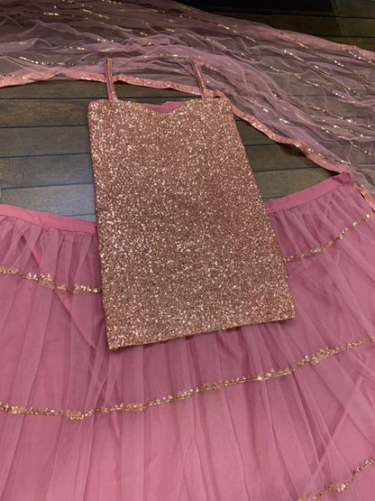 Dusty rose net sequence work long top lehenga
