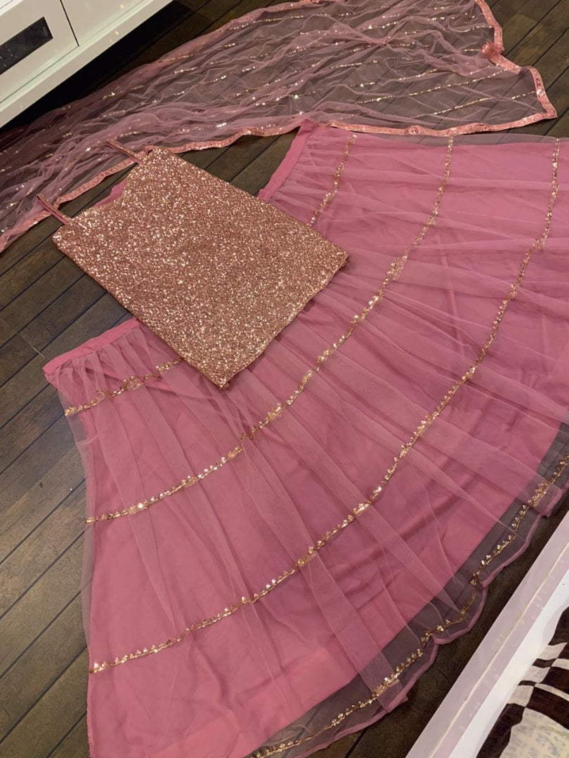 Dusty rose net sequence work long top lehenga