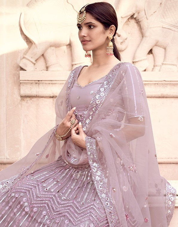 Dusty rose soft net sequence work bridal lehenga choli