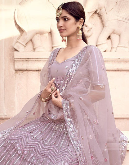 Dusty rose soft net sequence work bridal lehenga choli