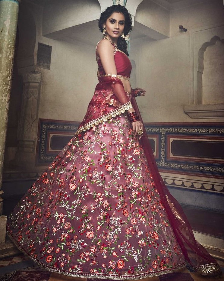 Dusty rose soft net zari and thread work bridal lehenga choli