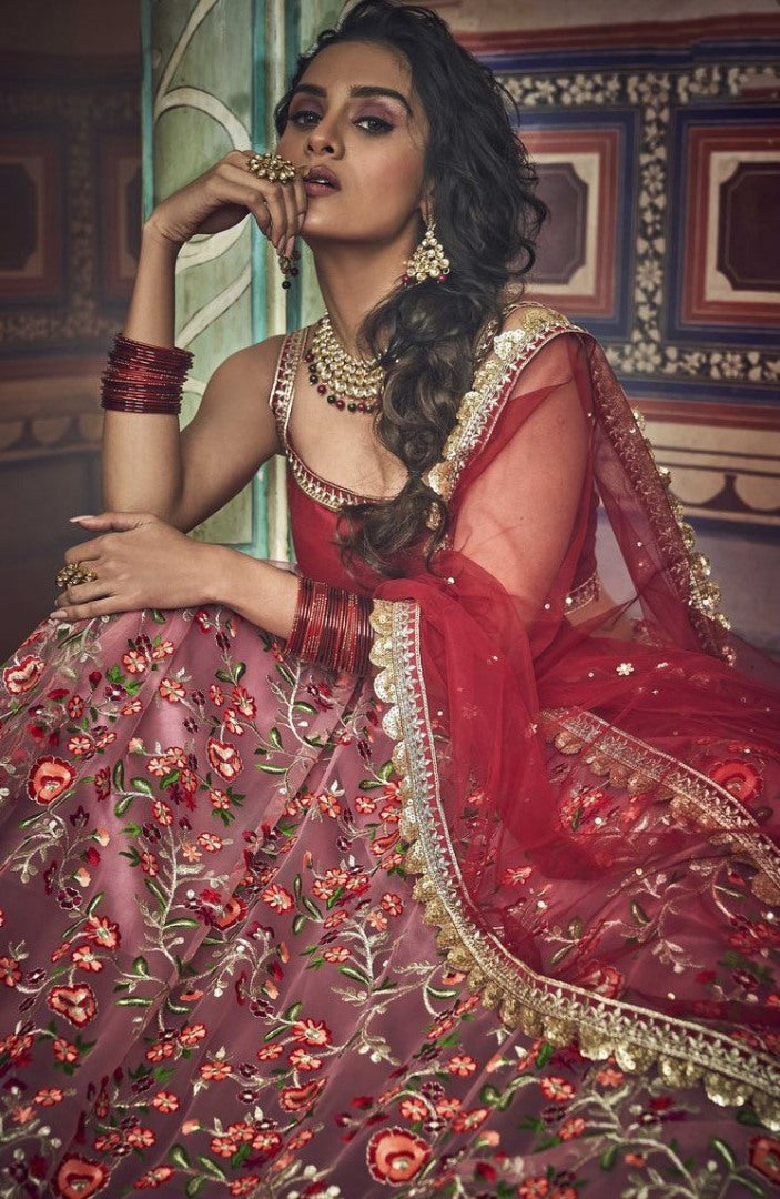 Dusty rose soft net zari and thread work bridal lehenga choli