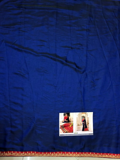 Embroidered sparkle silk blue wedding saree