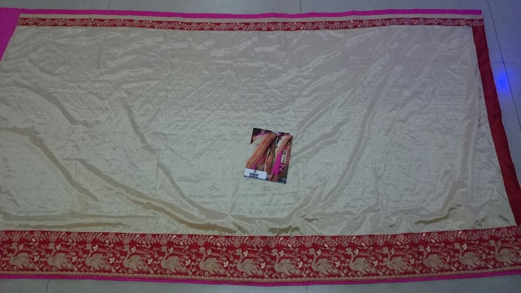 Fabulouos cream and pink embroidered saree