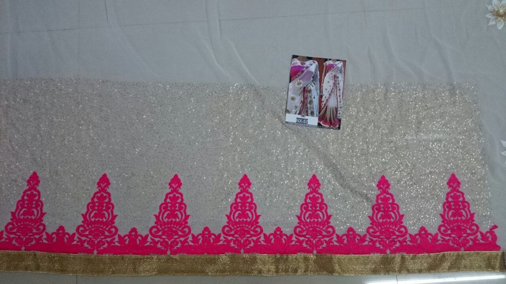 Fabulouos white embroidered saree