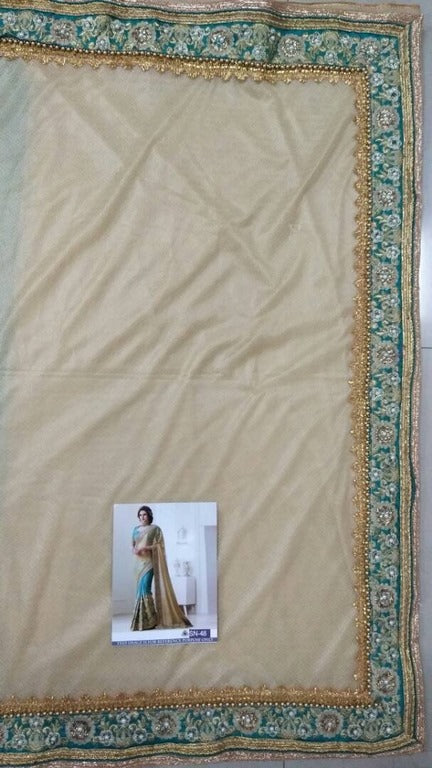 fabulous cream embroidered wedding saree