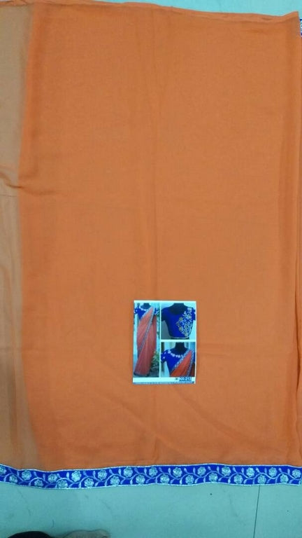 fabulous orange saree with fancy embroidered blouse