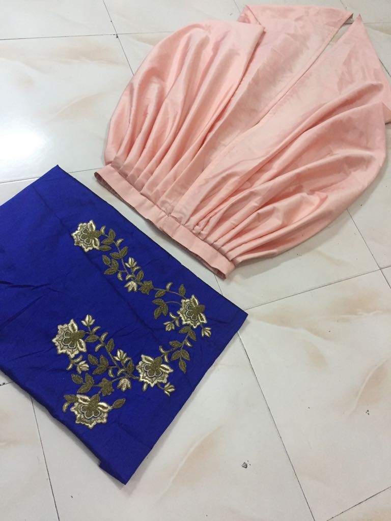 Fabulous peach dhoti and blue embroidered top suit