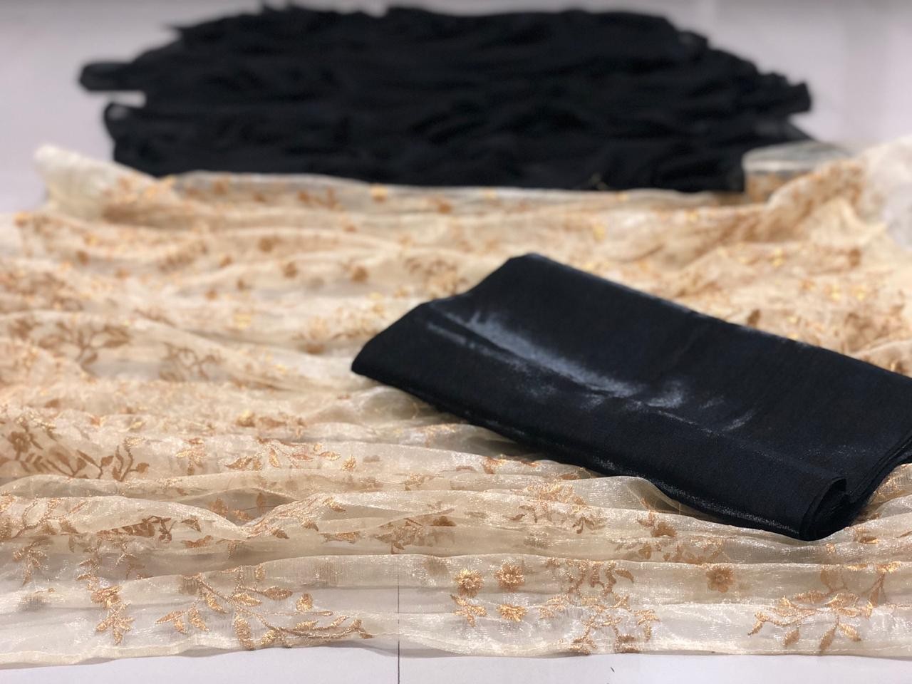 Gold net and black georgette designer emboridered partywear saree