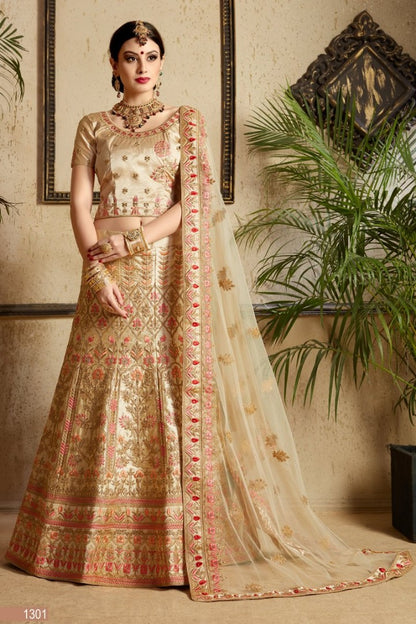 gold satin silk designer heavy embroidered bridal lehenga