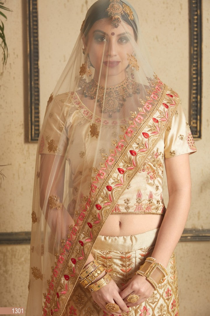 gold satin silk designer heavy embroidered bridal lehenga